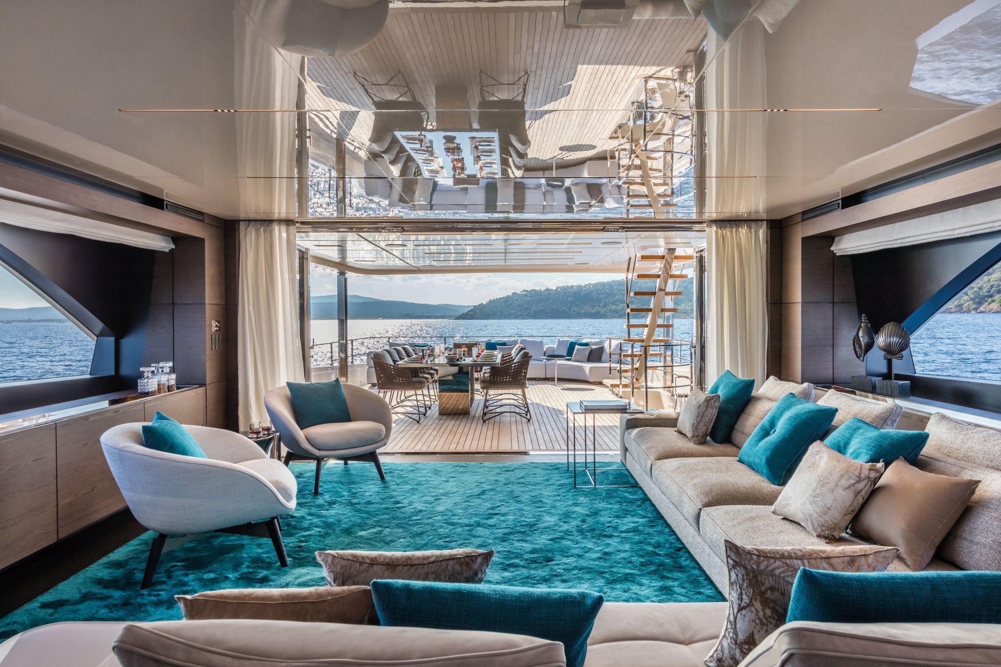 Luxury interior of Custom Line 42 by Ferretti with a salon featuring plush seating and soft lighting, via Starship Yachts.