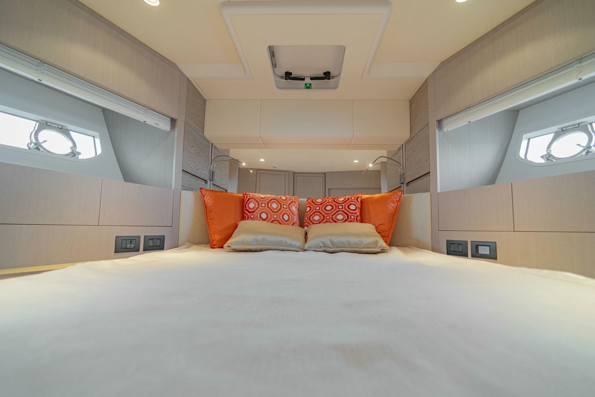 Master bedroom on Ferretti Yachts 500 with interior by MyArtYachts and Jim Thompson silk