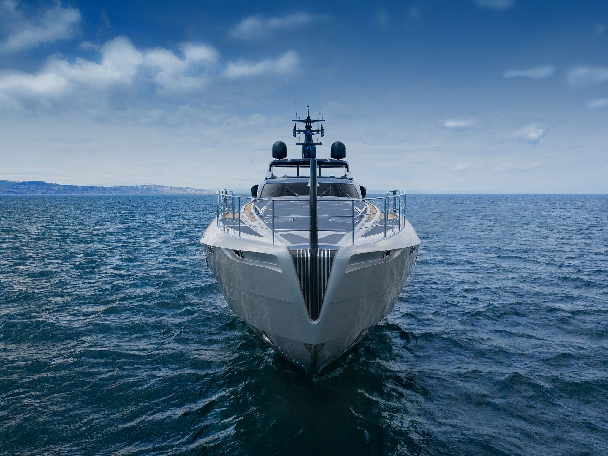 A magnificent, white Pershing Yachts 140 sailing in the vast open sea under a cloudy, blue sky.