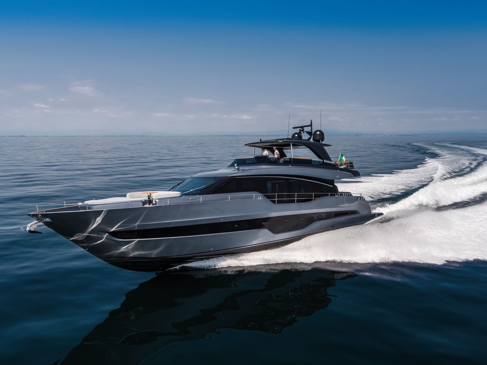 Cranchi Settantotto cruising on open water, brought to you by Starship yachts.