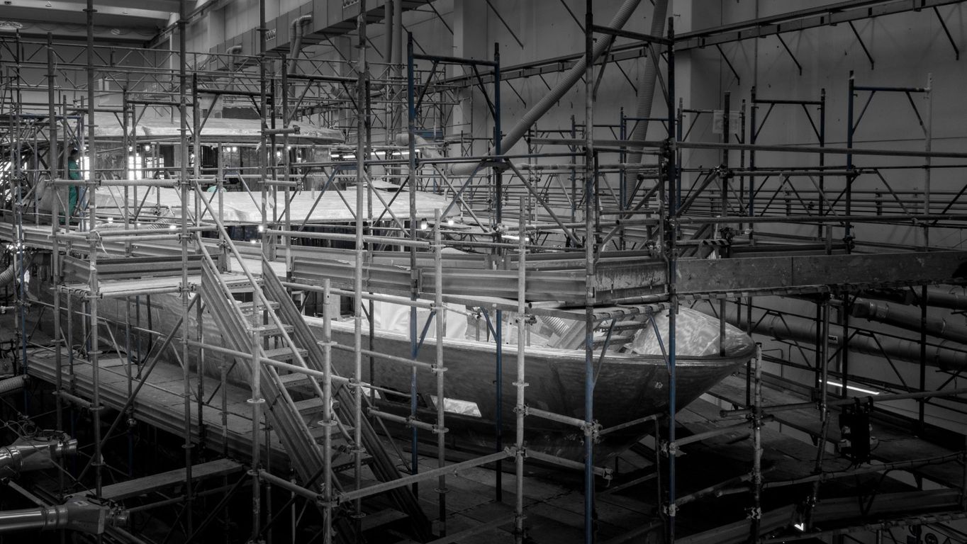 Motor yacht at port with expansive decks and modern features from Custom Line presented by Starship Yachts