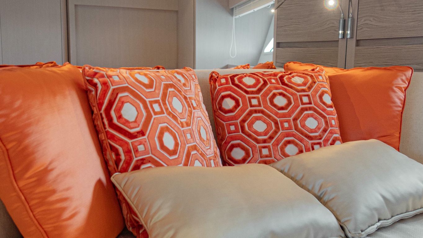 Guest room with twin beds and Jim Thompson accents on Ferretti Yachts 500