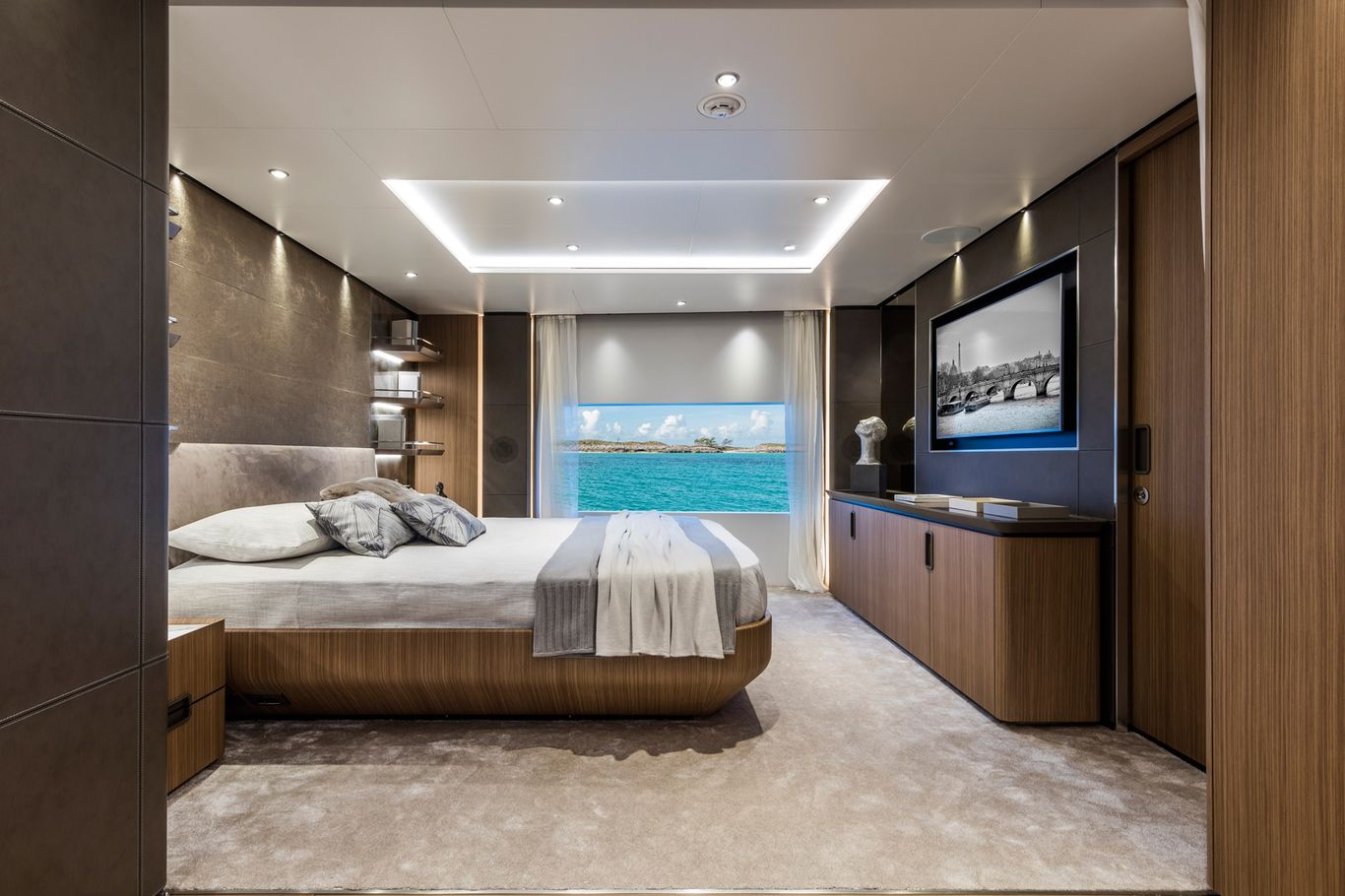 Luxurious master bedroom offering a scenic ocean view and minimalist design on a yacht, Custom Line 120.