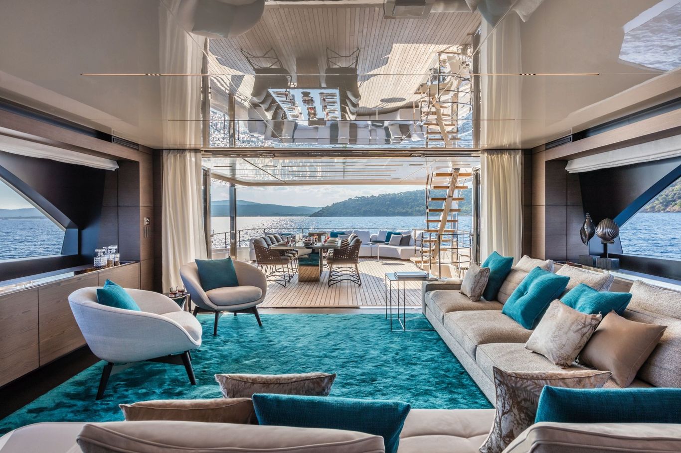 Luxury interior of Custom Line 42 by Ferretti with a salon featuring plush seating and soft lighting, via Starship Yachts.