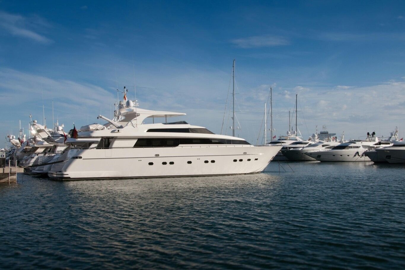 Marina yachts on the ocean, highlighting Starship Yachts' guide on yachts for sale in Hong Kong.