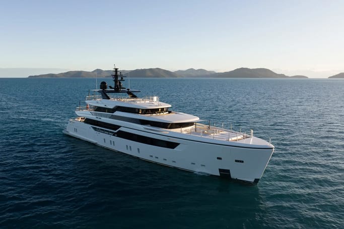 A white, luxurious Custom Line Yacht AIX displayed for charter in Australia.