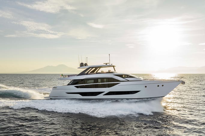Ferretti Yachts 860 cruising through the sea, showing off its sleek design.