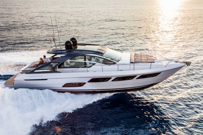 Pershing Yacht for sale: A chic, white Pershing 5X cruising proudly on a the open ocean.