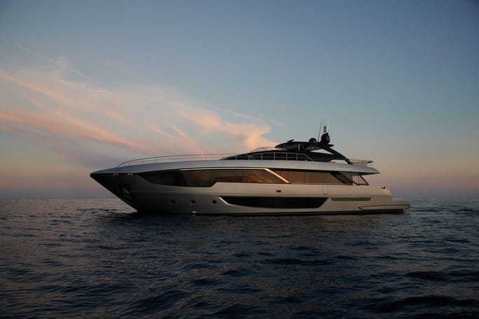 Latest 102'Corsaro Super by Riva floating on the water, showcased for sale.
