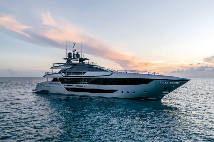 Luxurious superyacht 130'Bellissima by Riva floating elegantly on the open sea.